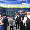 SZPulse booth at the Canton Fair with global buyers discussing verification and consulting services